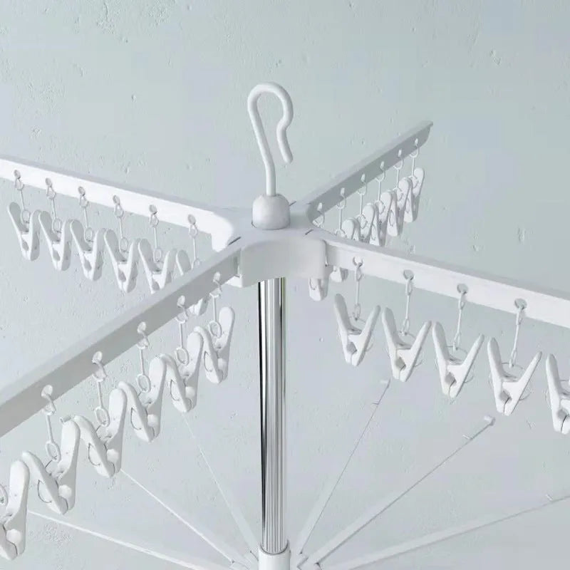 Three-layer stainless steel drying rack with mobile plastic clips for trousers, ties and socks