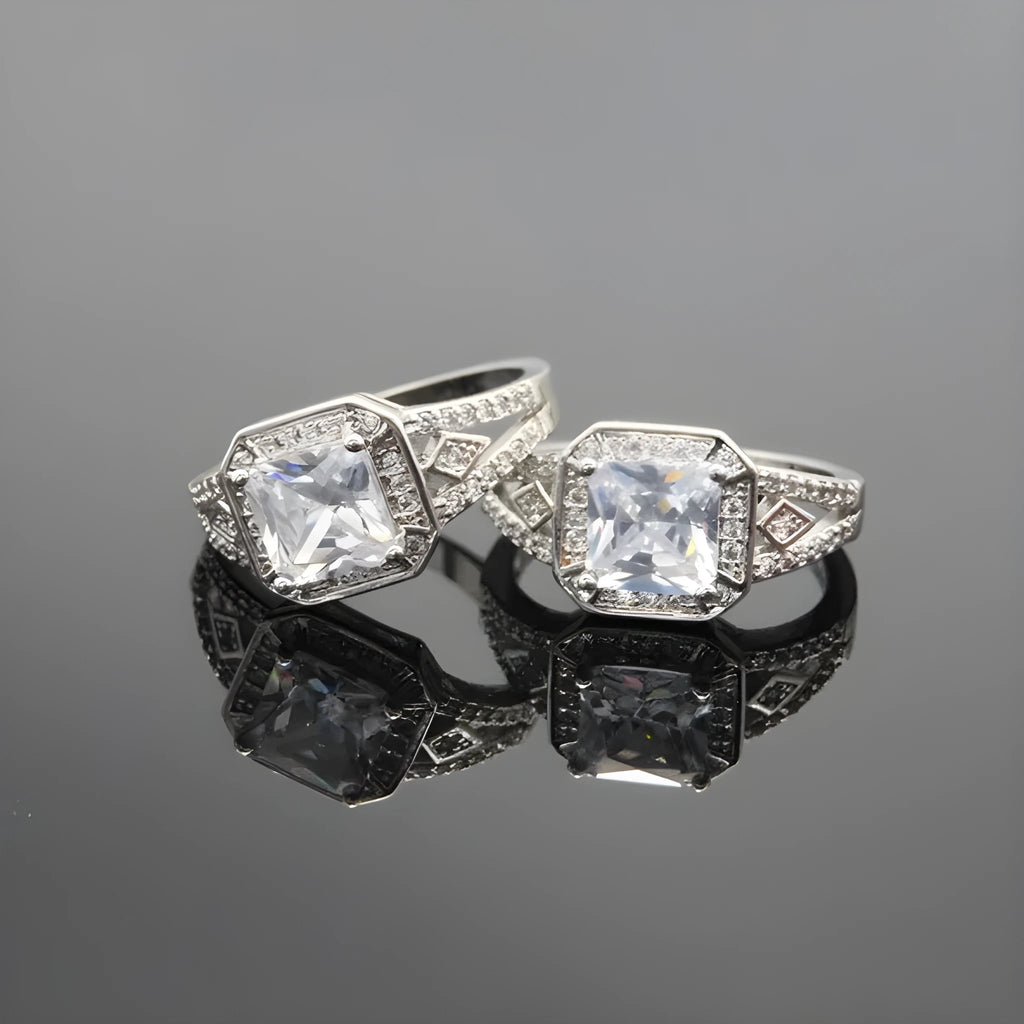Geometric platinum colour zircon ring with quadrilateral design and hollow ornament construction