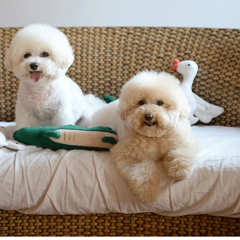Green durable plush dog toy with squeaker, shown at 35 cm length for scale.