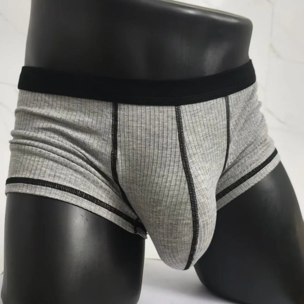 Men's breathable boxers in Army Green solid colour showing thin fabric construction and body shaping design