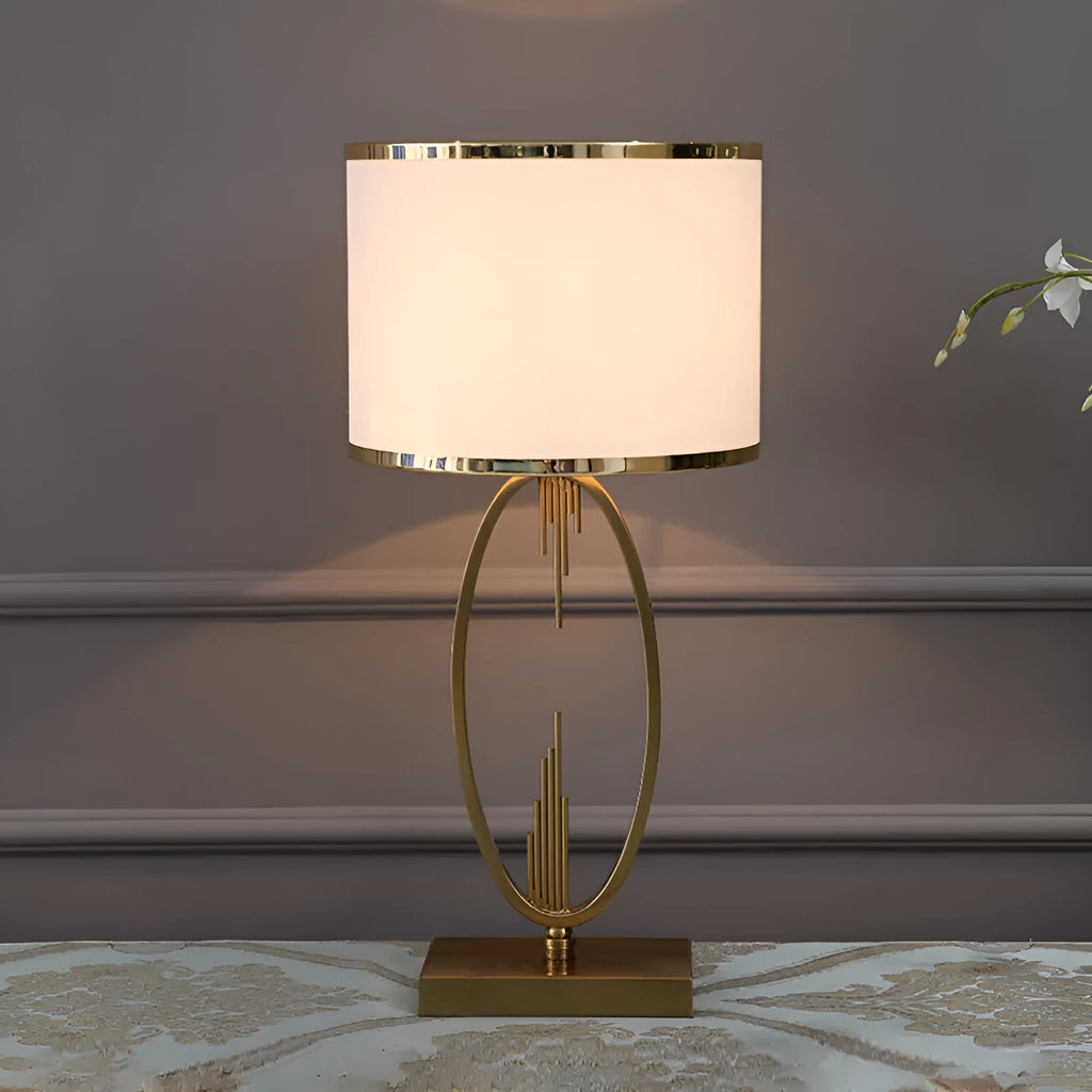 White Nordic style bedside lamp with drum shape and Phnom Penh trumpet design on a wooden table