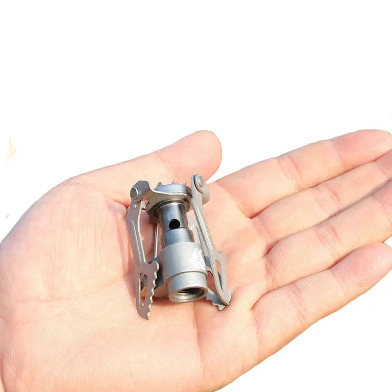 Portable camping gas stove with one-piece furnace for outdoor cooking