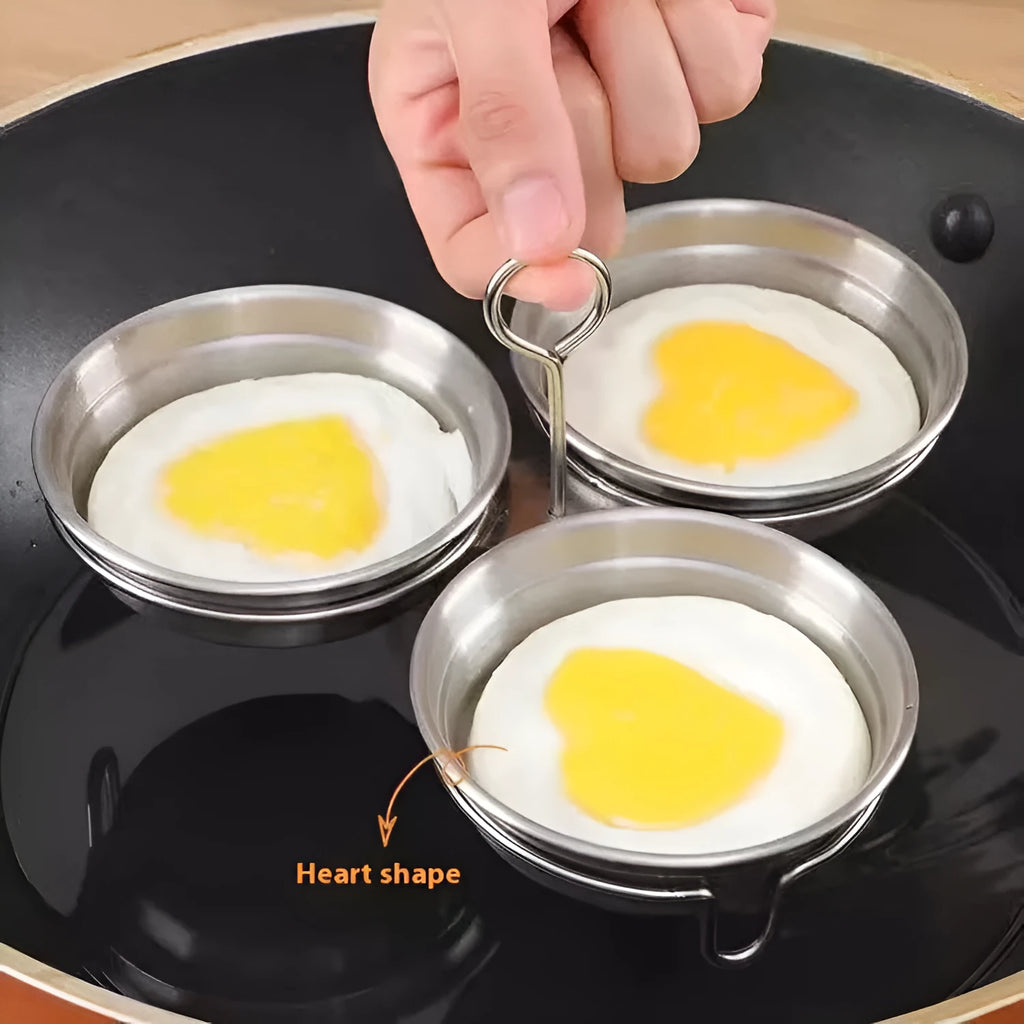 Mini stainless steel egg steamer kitchen appliance in round or heart-shaped design for boiling eggs