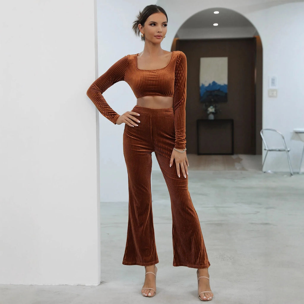 Caramel-coloured long sleeve sweater and trouser set on hanger