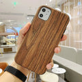 Slim wooden iPhone back cover in natural rosewood, teak, black rose, and walnut finishes