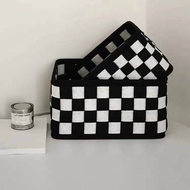 Checkerboard patterned felt storage basket with dimensions 37cm by 29cm by 19.5cm