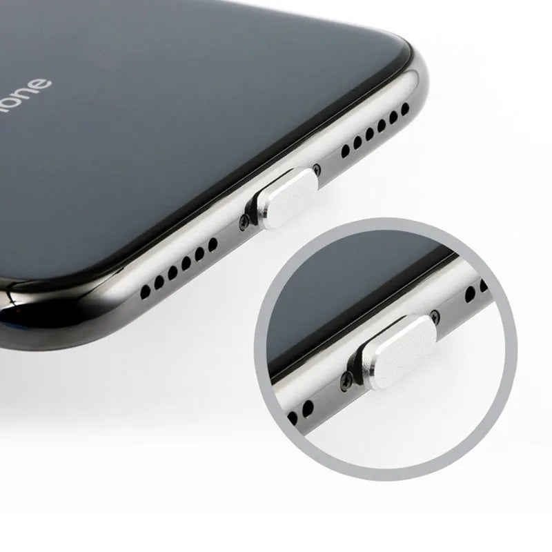 Aluminium alloy mobile phone charging port dust plug for iPhones, shown in rose gold colour.