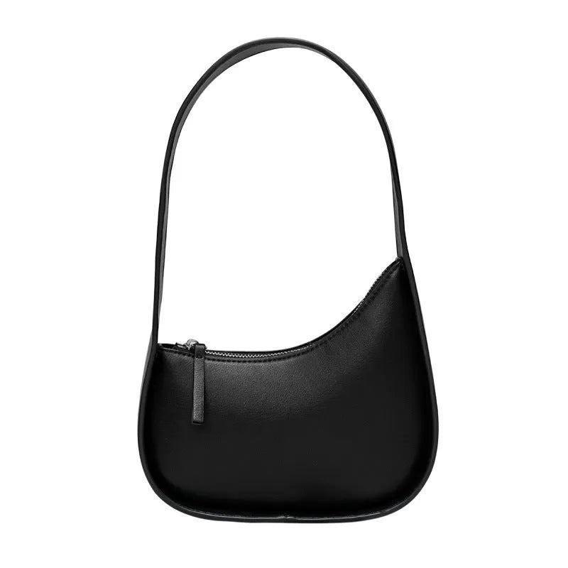 Genuine leather half moon women's handbag with wide shoulder strap in caramel colour
