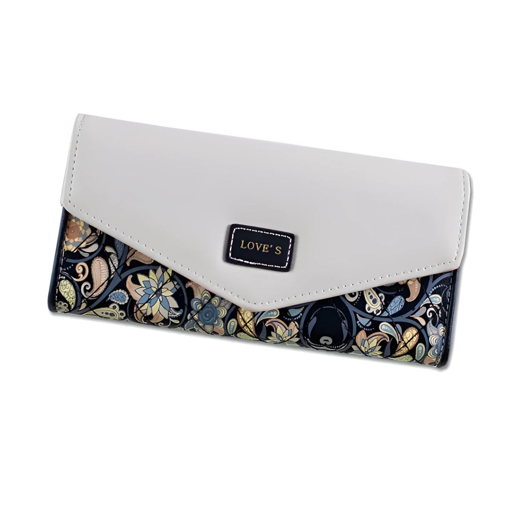 Women's black trifold leather wallet with buckle clip closure showing card slots and coin compartment