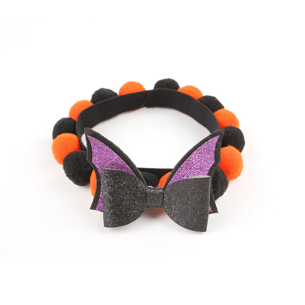 Halloween pet collar with fluffy fur ball accessory in pumpkin design, shown in size M