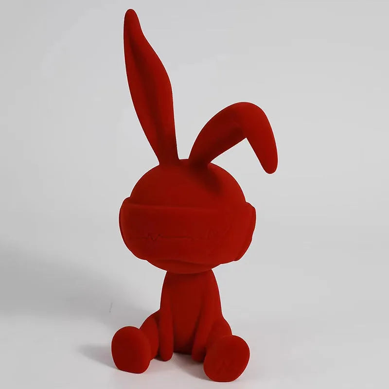 Blue resin rabbit table ornament with suede blindfold decorative detail
