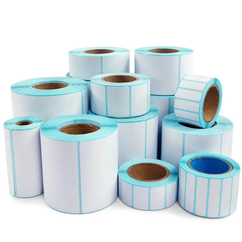 Roll of waterproof black and blue sticky sticker labels 20mm x 10mm 3000 sheets double row horizontal layout on table