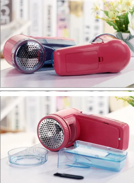 Blue portable electric lint remover for clothing, showing compact size next to a sweater.