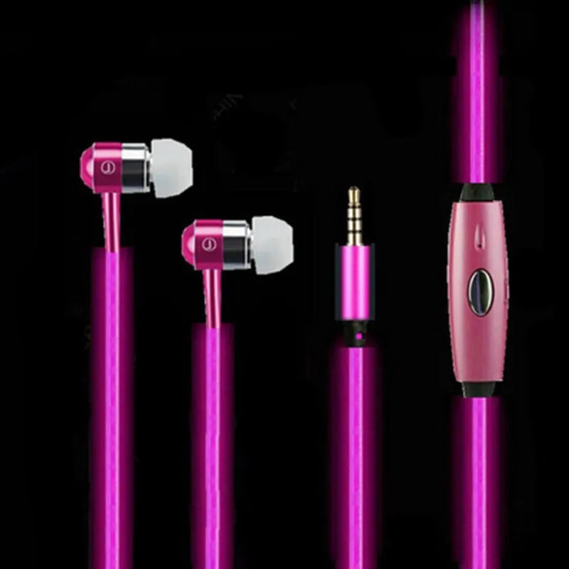 Blue LED light up earphones with 3.5mm plug and in-line remote control on a dark background