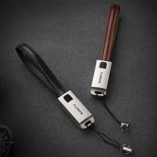 Leather wrapped iPhone charging cable with zinc alloy connector showing 20cm length