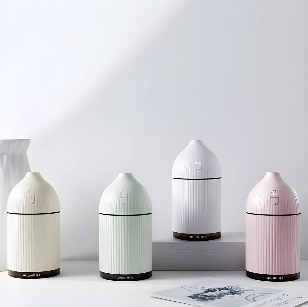 White ultrasonic aromatherapy diffuser and humidifier with LED light, 80mm diameter