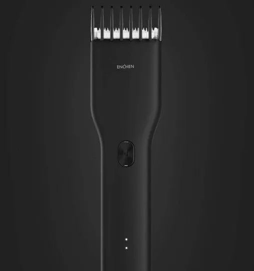 Black and white cordless electric hair clipper with ceramic cutter head and adjustable comb.