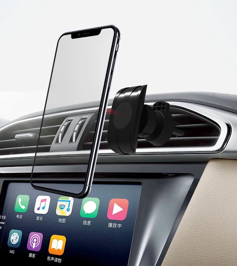 Glossy black car phone holder mounted on vehicle air vent holding smartphone