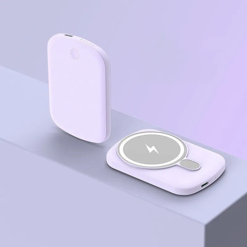Slim Magsafe magnetic wireless power bank in Barbie Pink, shown next to an iPhone.