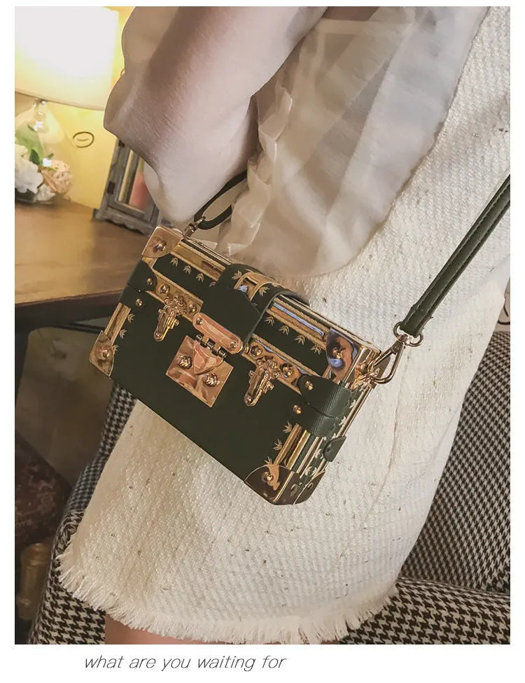 Women's black PU leather shoulder bag with flap closure and adjustable crossbody strap