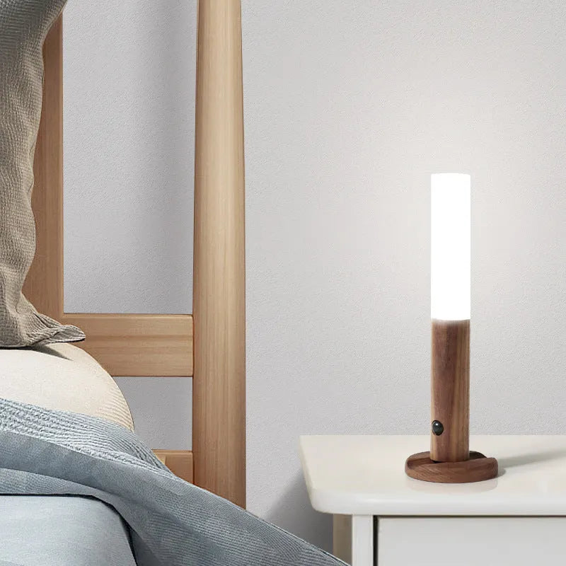 Compact smart sensor LED desk lamp made of solid wood and organic glass in coffee colour.