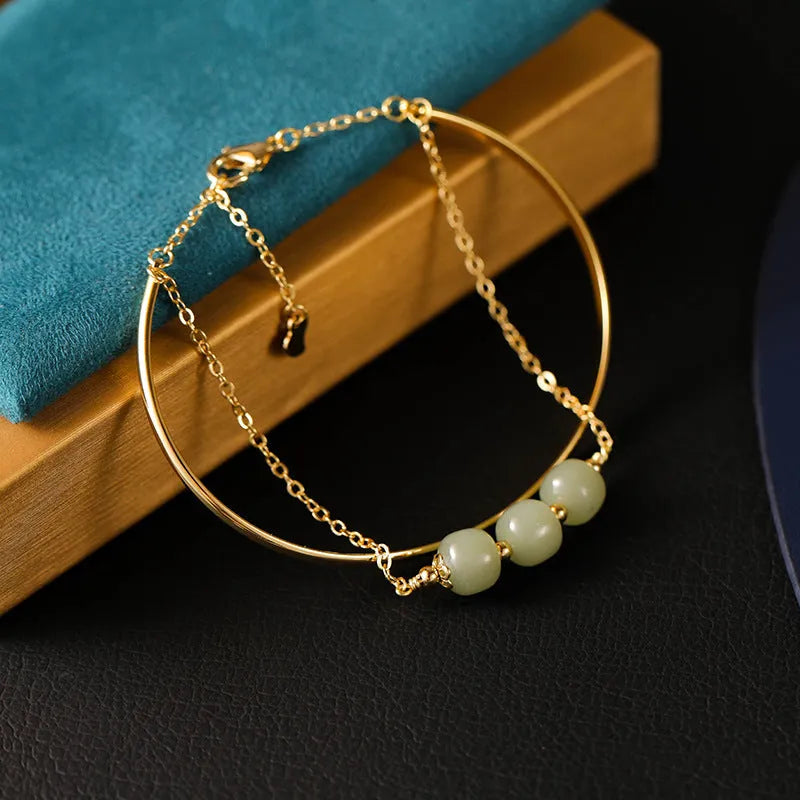 Jade lucky bead bracelet for women with gold inlay treatment in single, double and three beads versions