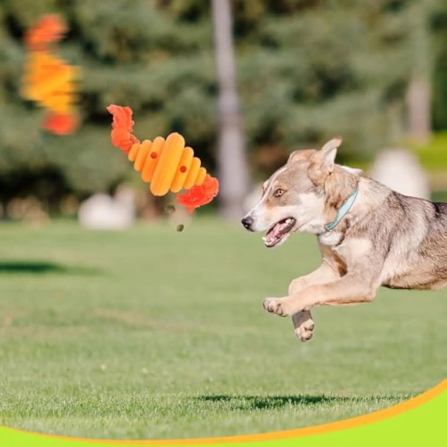 Green and yellow dog ball with knotted rope toy for large breed interactive play and treat dispensing