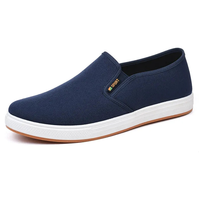 Men's black canvas slip-on shoes with round toe and low-top design