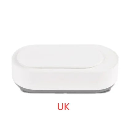White portable ultrasonic cleaner machine with stainless steel tank for cleaning jewellery and glasses.