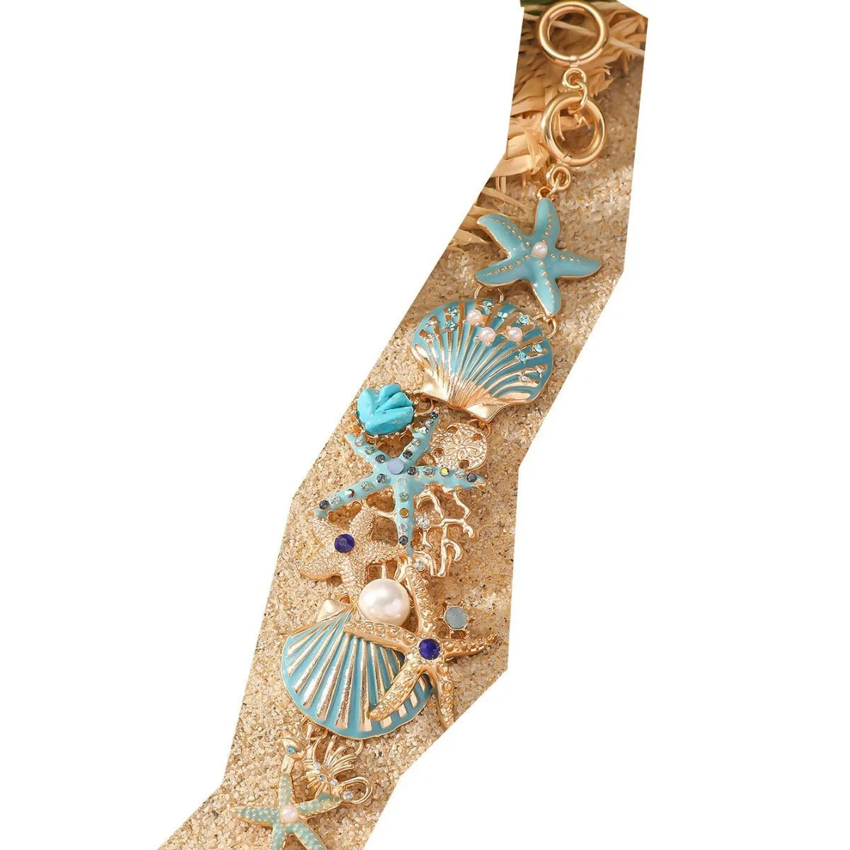 Alloy marine shell boat anchor rhinestone bracelet with starfish details in turquoise colour.