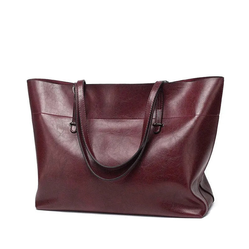 Casual wax cowhide leather ladies crossbody handbag shown in a choice of colours including black, brown, and rose red.