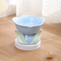 Blue floral patterned ceramic elevated pet bowl with non-slip base for cats and small dogs