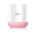 Cherry Pink foot cleansing cup pet footbath with soft silicone bristles and ABS construction by a door