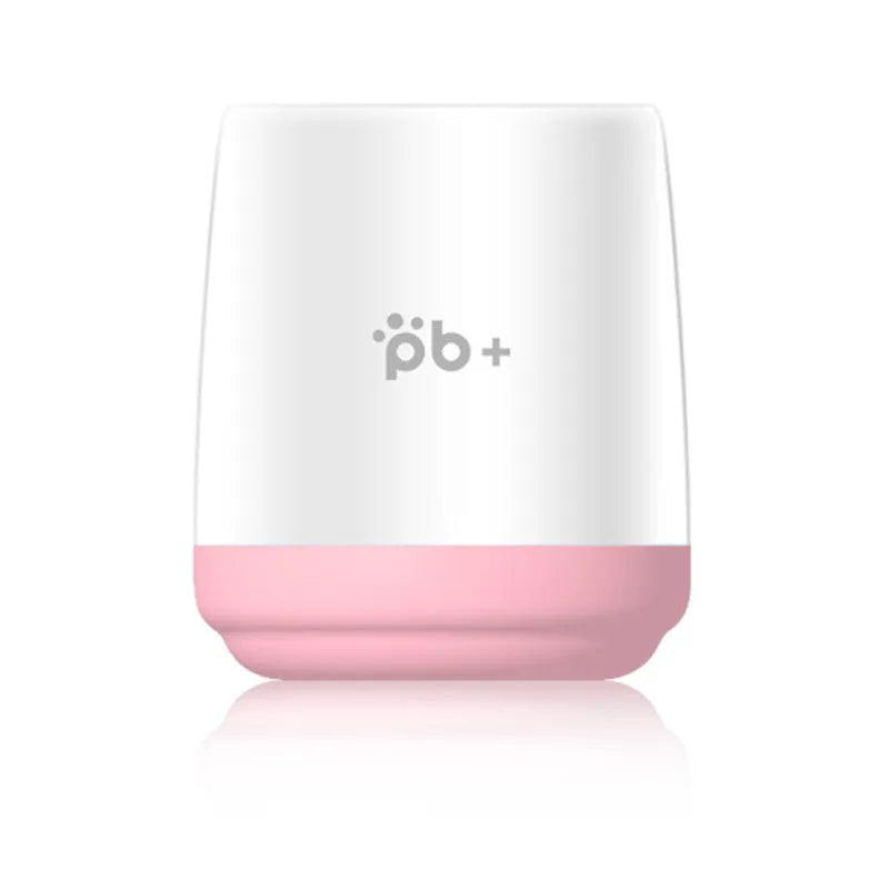 Cherry Pink foot cleansing cup pet footbath with soft silicone bristles and ABS construction by a door