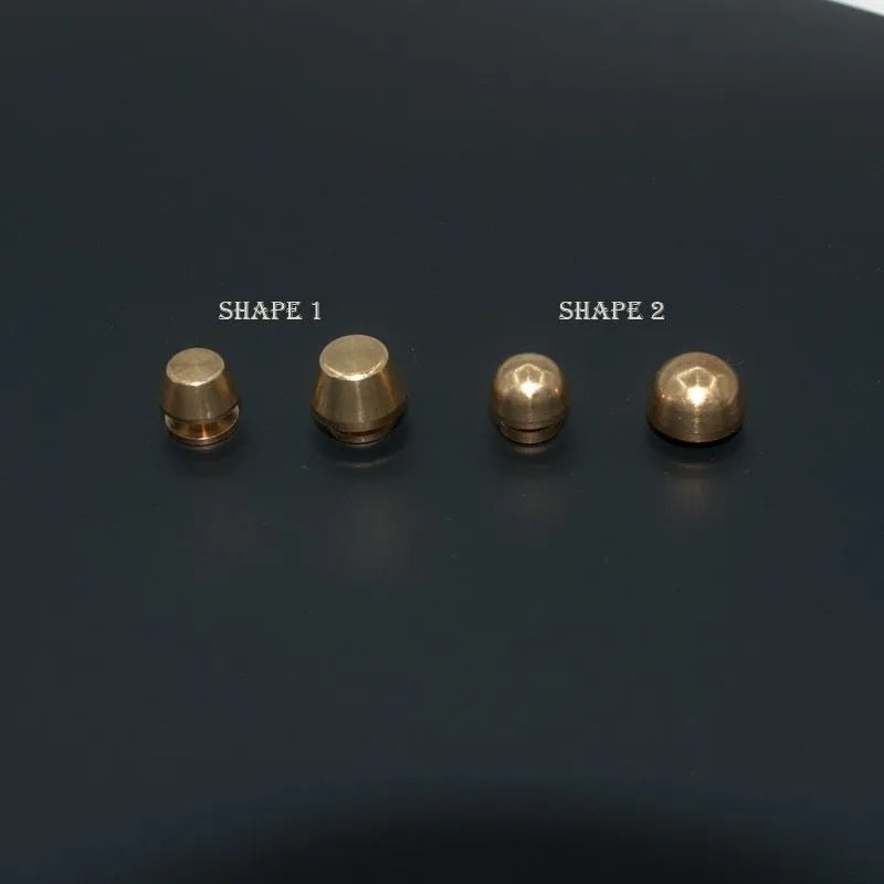 Brass decorative buckles showing round and bucket foot nail designs in 10x6mm and 12x7mm sizes