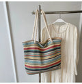 Blue straw woven nylon shoulder bag with single strap and woven texture pattern