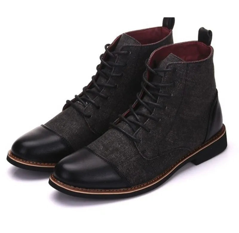 Men's black leather motorcycle boots with a belt buckle and thick rubber sole.
