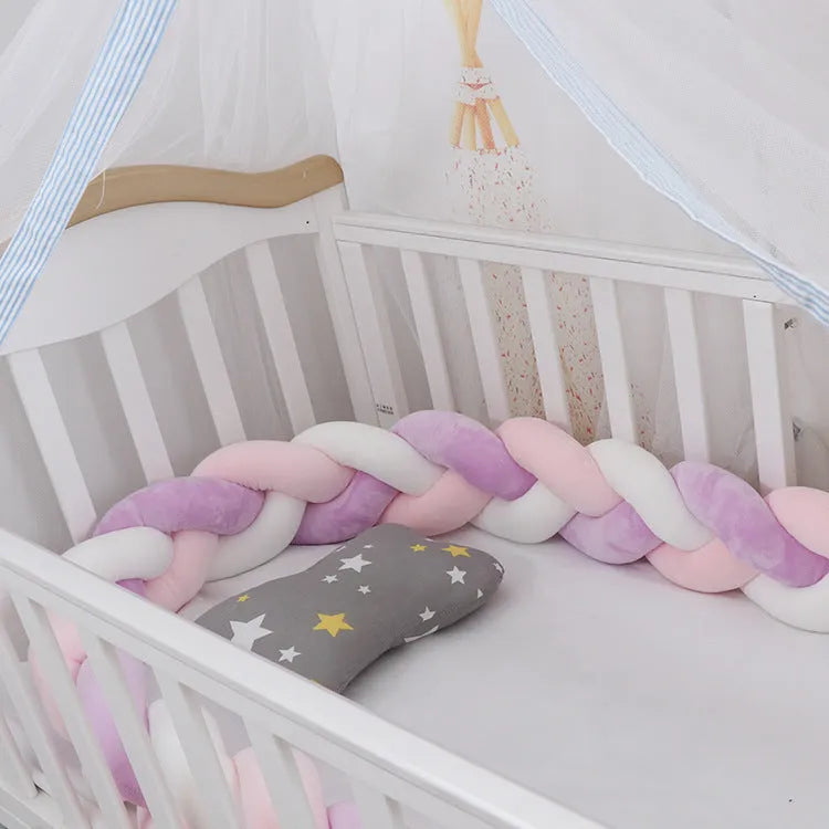 Soft spandex velvet baby crib bumper protector shown in a light grey colour, shaped around white crib bars.