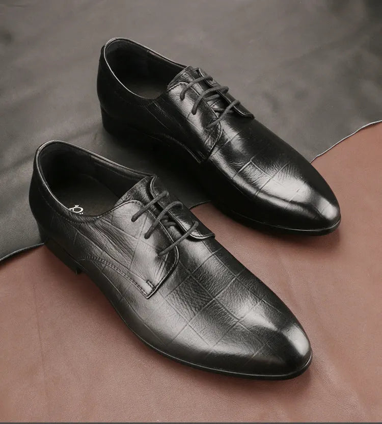 Men's black leather derby shoes with pointed toe and sewing details on antiskid rubber sole