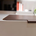 Black large PVC computer desk mat 700x450x3mm for keyboard and mouse on a wooden desk