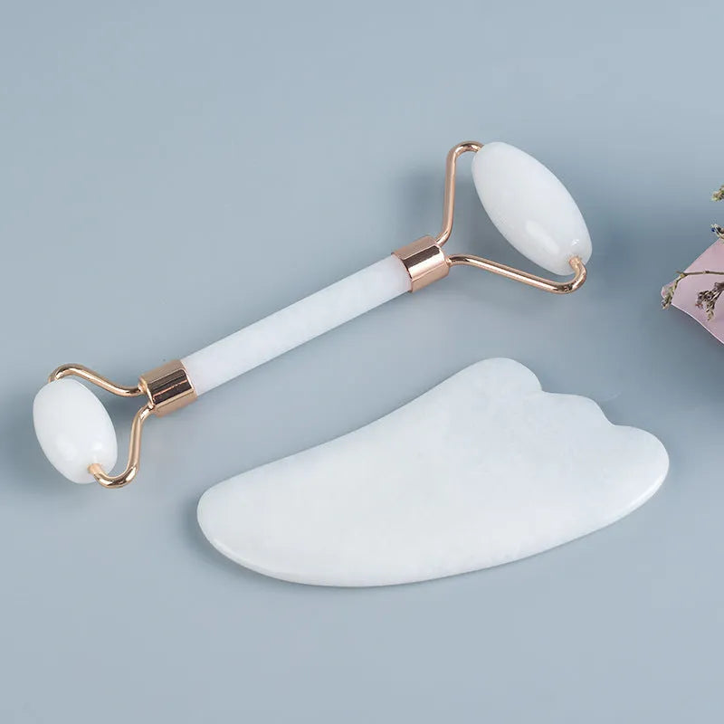 White jade double-headed facial roller and optional wooden gua sha scraping board.