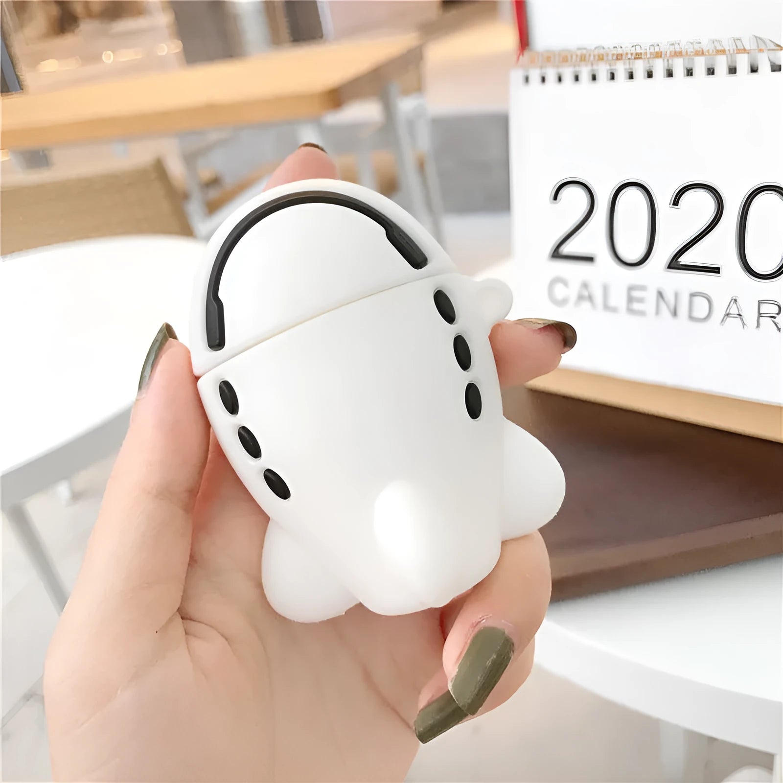 Silicone flip case for AirPods with airplane cartoon design and hook attachment