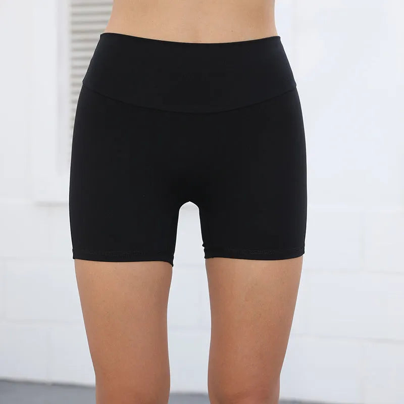 Women's high waist hip lifting sports shorts with side pockets in electric blue colour