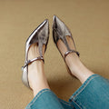 Women's gun colour genuine leather pointed-toe Mary Jane pumps with a chunky mid heel and sheepskin lining.