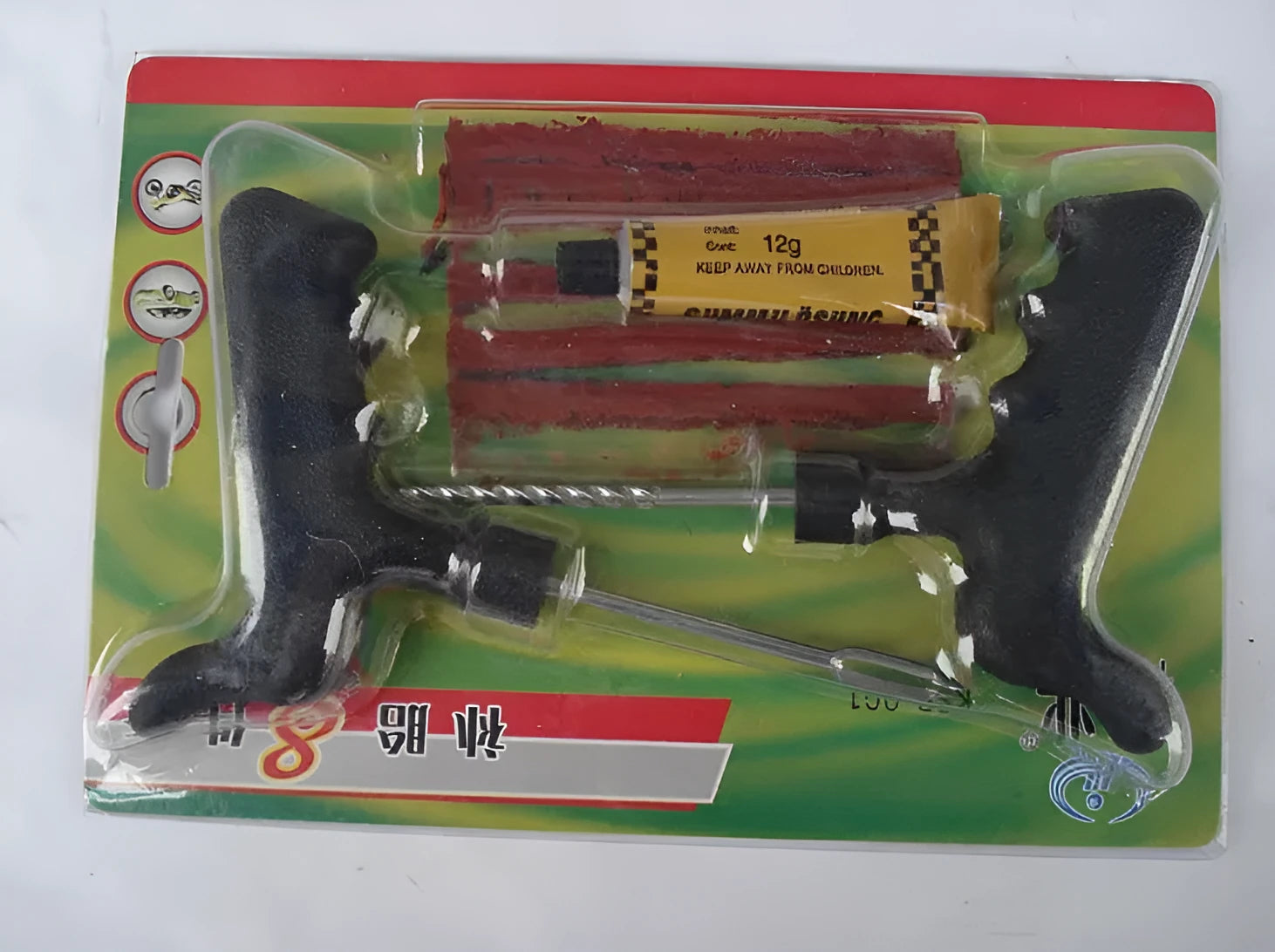 Black or yellow 8-piece vacuum tyre repair tool kit with rubber strips, glue, probe, and pin.