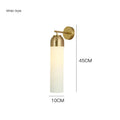 Nordic postmodern minimalist glass wall lamp in choice of five light colours on a plain wall