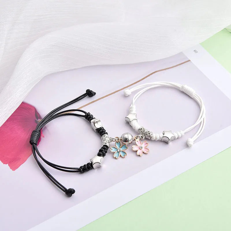 Magnetic couple bracelets with crown and diamond designs in alloy electroplated construction