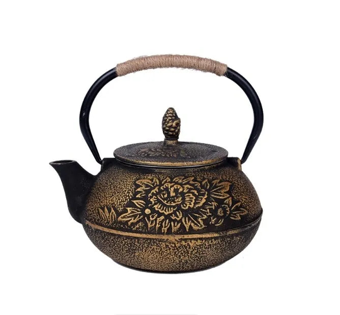 A cast iron teapot with Japanese-style hand-painted decoration, shown in a Bronze finish, with a capacity of 0.9 litres.