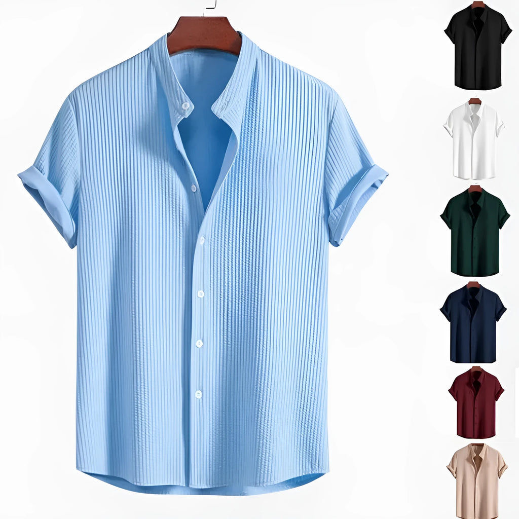 Men's loose fit short sleeve polyester summer shirt on a hanger, shown in a light blue colour.