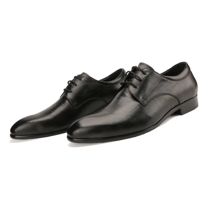 Men's black leather derby shoes with pointed toe and sewing details on antiskid rubber sole